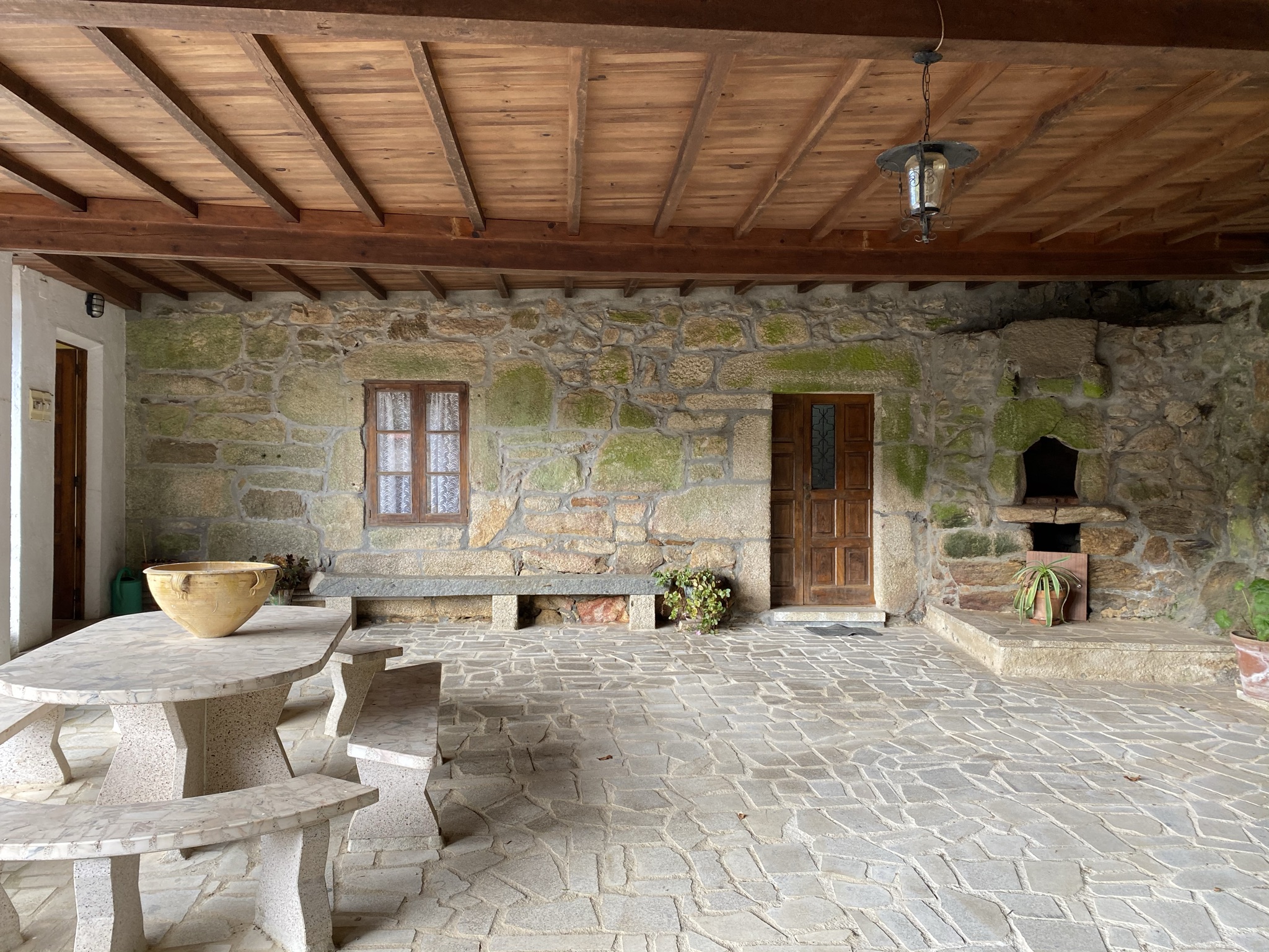 The covered patio of my Galcian house